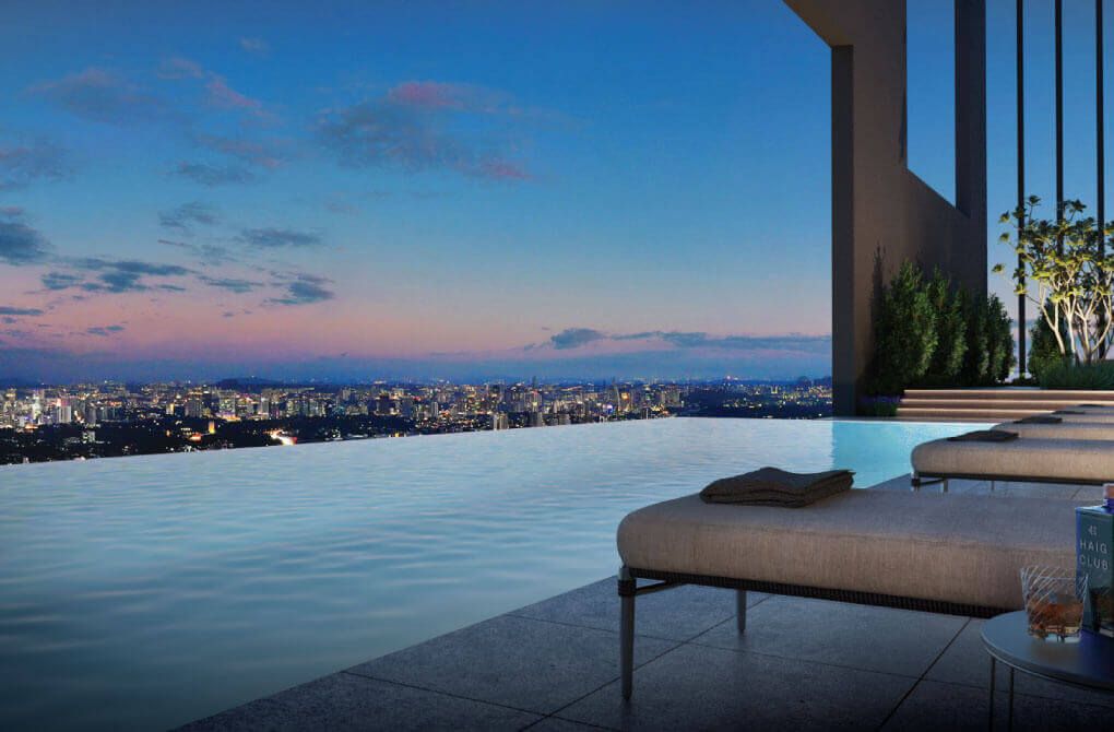 Rooftop infinity pool overlooking the Kuala Lumpur skyline at dusk